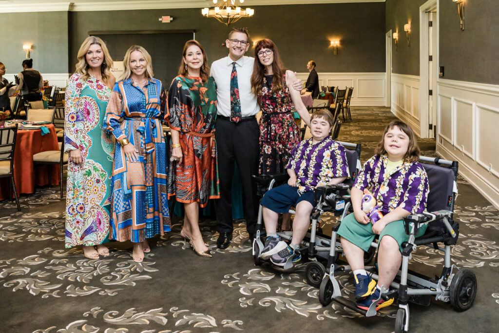 (From left) Keri Bellacosa-Walling, Jennifer Stevens, Venus Strawn, and Tim, Laura, Timothy and Andrew Revell