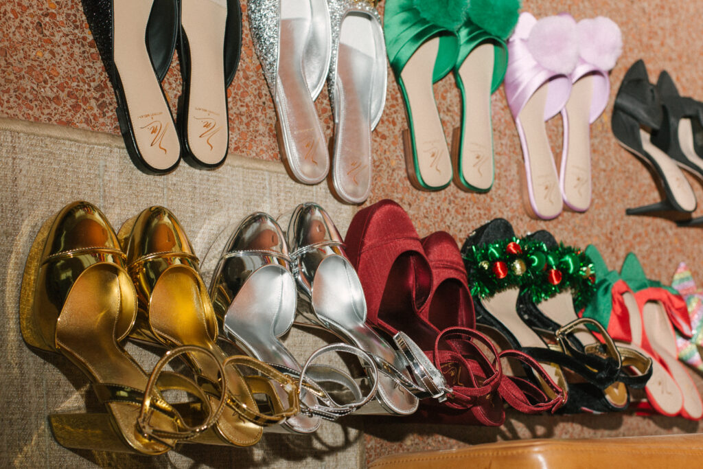 a collection of festive holiday flats and heels.