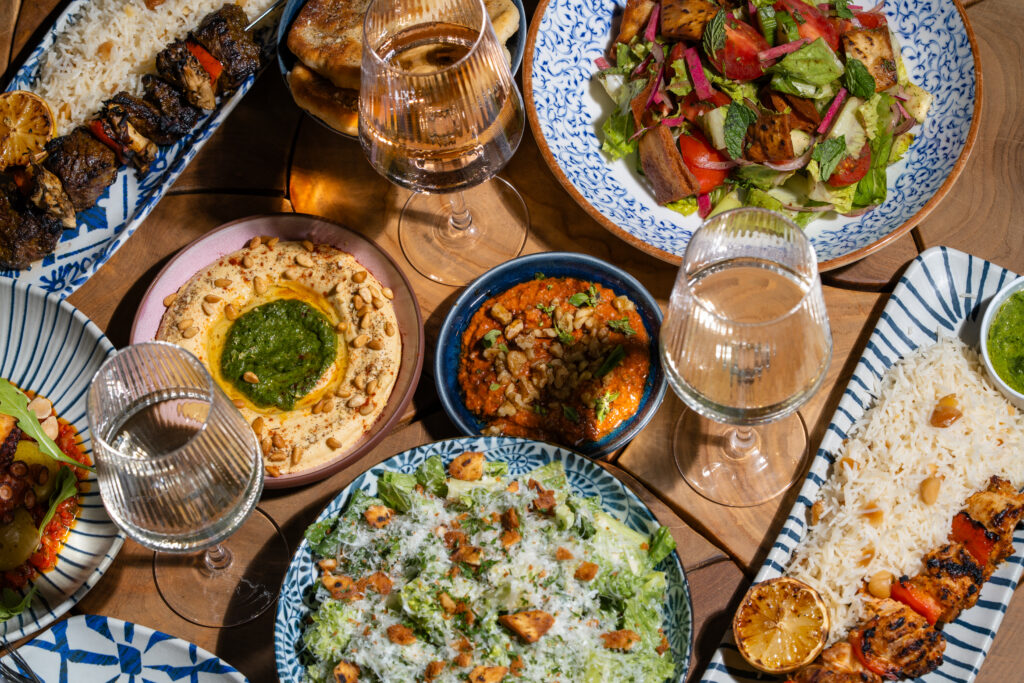 A spread of Mediterranean dishes at Amaya, the new rooftop restaurant at Paseo.