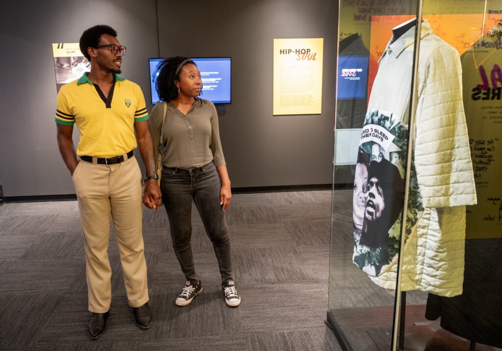 Visitors explore the “Hip-Hop America: The Mixtape Exhibit” at the LBJ Library. (Photo by Jay Godwin)