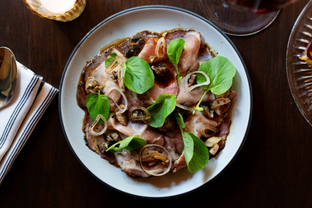 Poeta's pork coppa with mushroom escabeche and watercress. (Photo by Katherine Irwin)