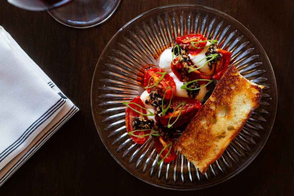 Stracciatella with tomato and sourdough focaccia from Poeta. (Photo by Katherine Irwin Photography)