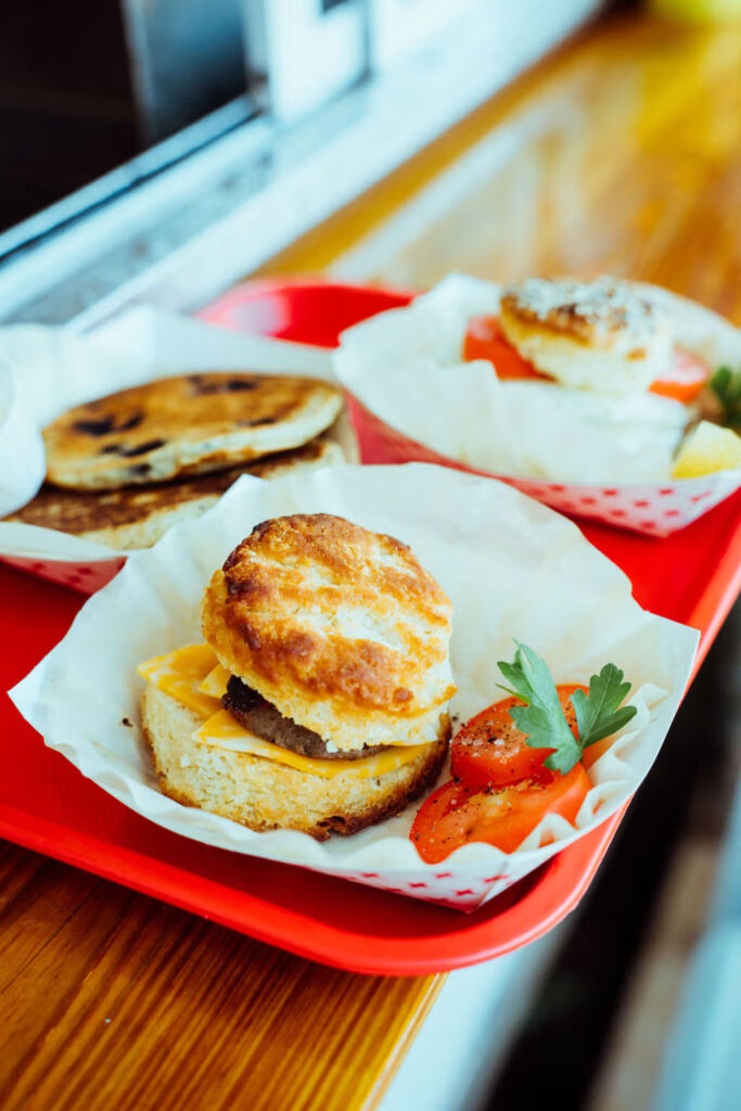A sausage and cheese biscuit from Lynny’s, now serving from its first brick-and-mortar on East 12th Street.