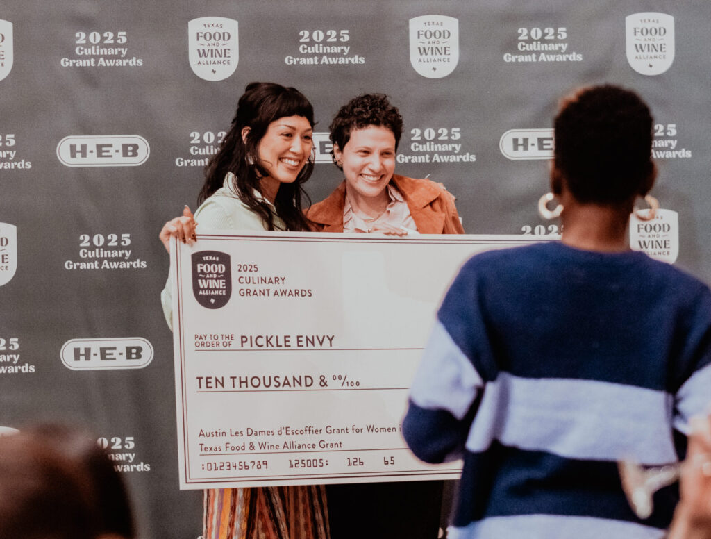 Mae Hardebeck and Libby Goldman of Austin-based Pickle Envy accept a grant award from the Texas Food & Wine Alliance. (Photo by Jasmin Porter)