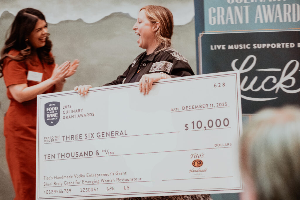 Three Six General owner Matti Bills accepts a $10,000 grant award for facility improvements from the Texas Food & Wine Alliance. (Photo by Jasmin Porter)