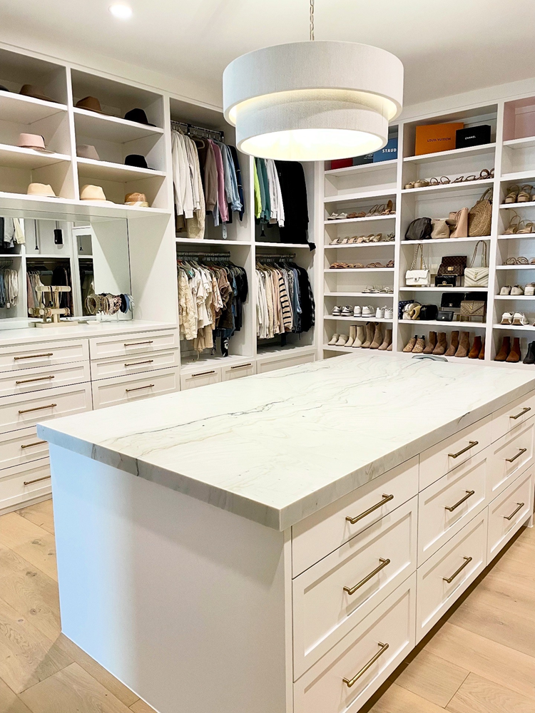 PaperCity-241574501097153-6431395174816425912-Her Walk In Closet Organization by Settled In Soundly