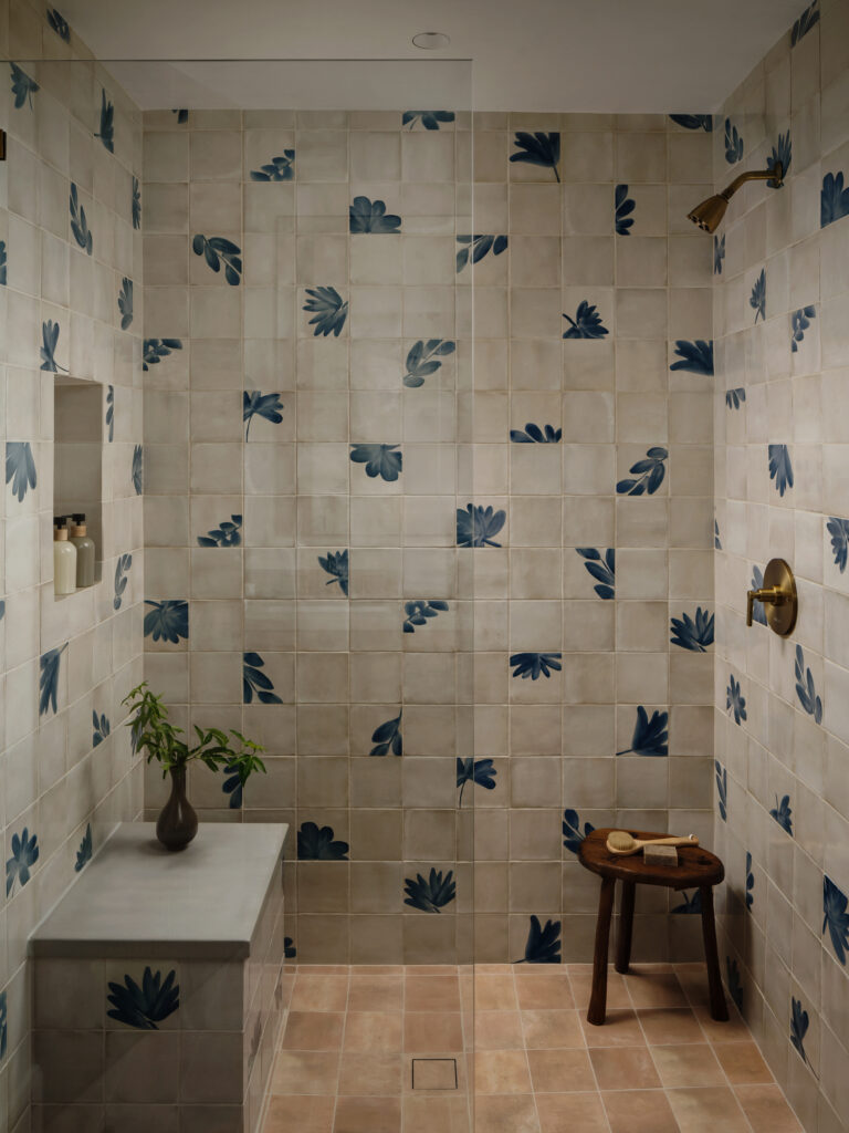 Hideaway shower features beautiful tile work. (photo by Chase Daniel)