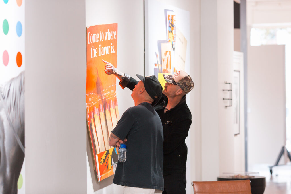 Guests view artwork during the “Beyond the West” public reception at West Chelsea Contemporary. (Courtesy of West Chelsea Contemporary)