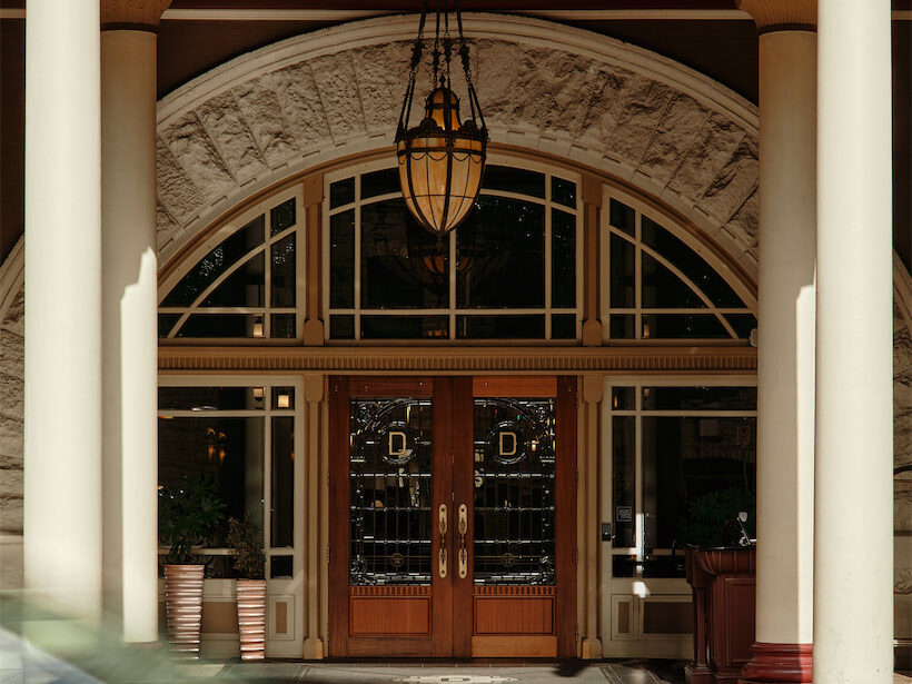 (photo courtesy of The Driskill)outside valet w moving car