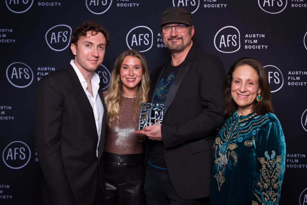 (From left) “Spy Kids” actors Daryl Sabara and Alexa PenaVega, director Robert Rodriguez and producer Elizabeth Avellán pose with their award during the 2026 Texas Film Awards at Troublemaker Studios in Austin, Texas, on March 5, 2026. (Photo by John Pesina)