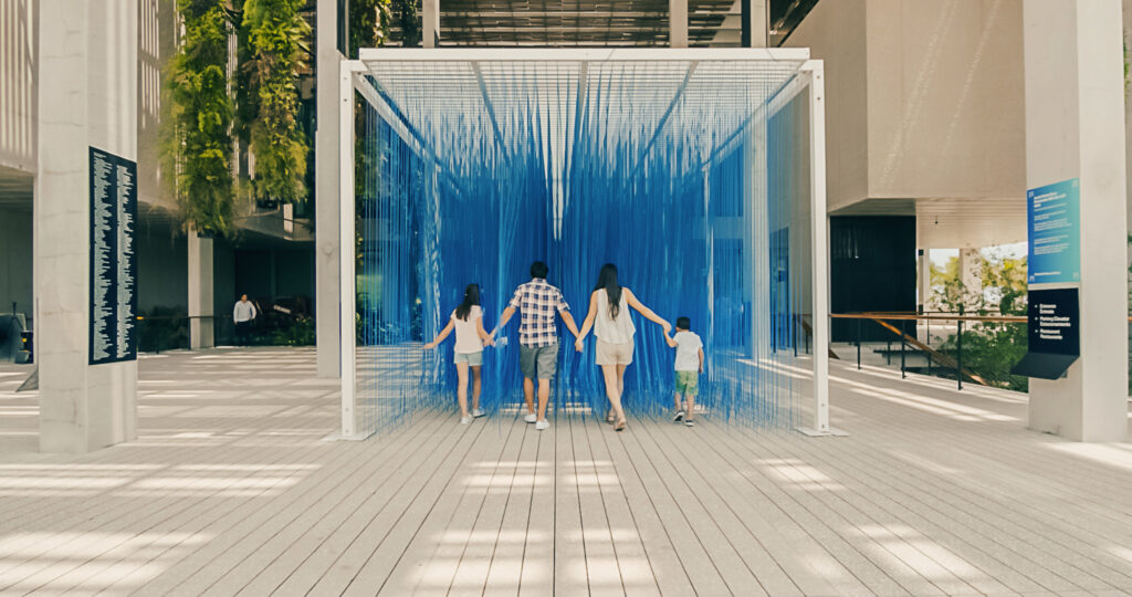 Family entering the Perez Art Museum Miami in Downtown Miami.
