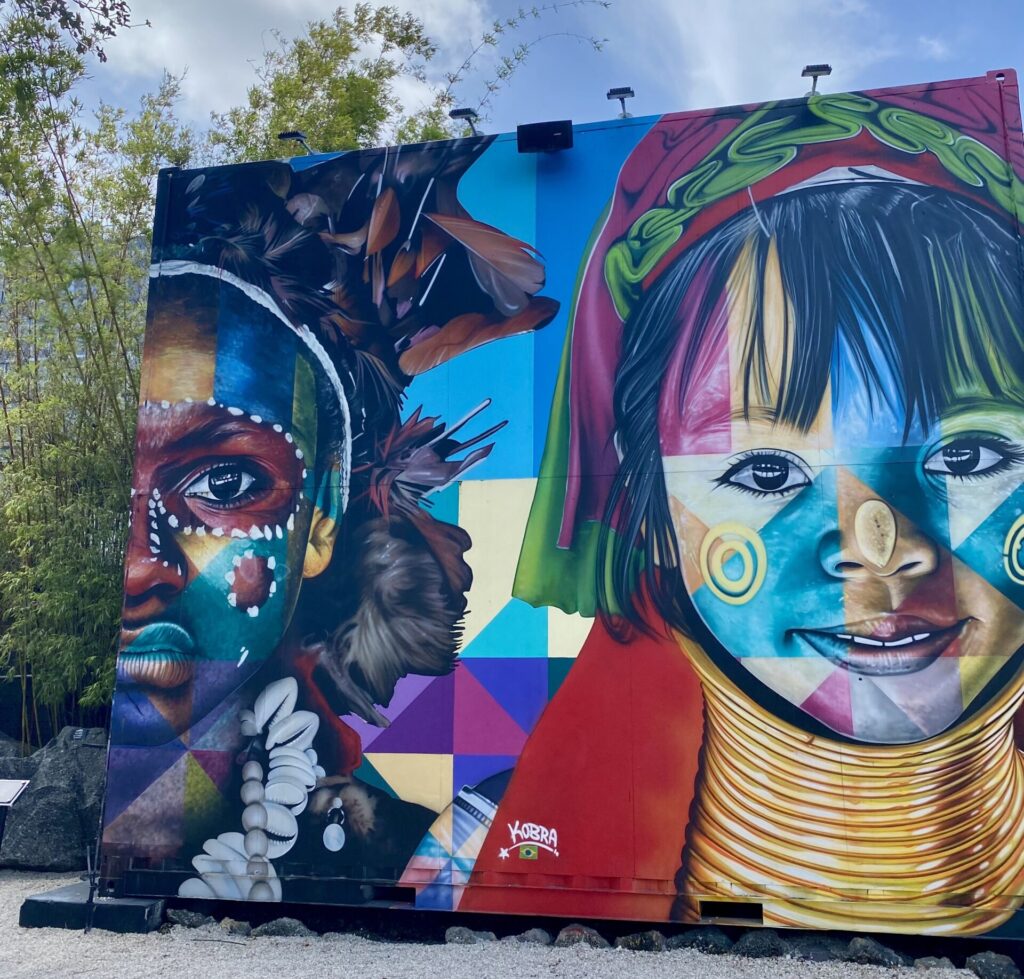 Colorful mural depicting children at Wynwood Walls, Miami.