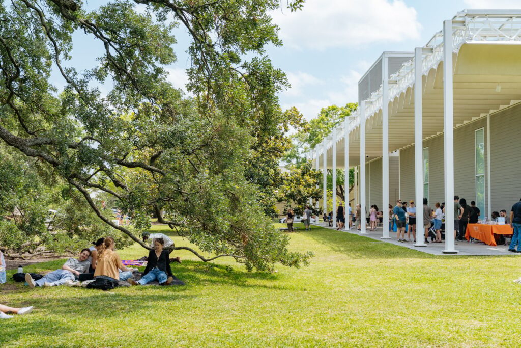 Having a picnic on the grass at The Menil.