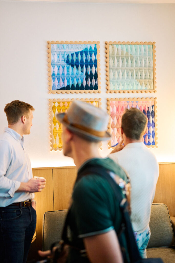 Guests view artwork during the VIP preview of Friends Fair at The Loren Hotel Austin on May 15.