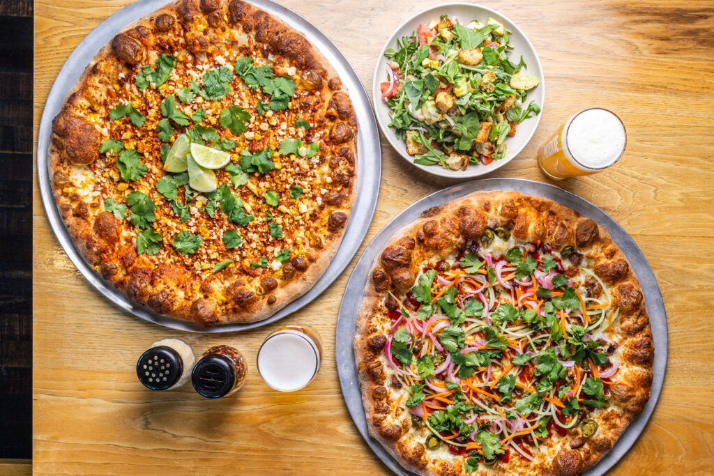 Pinthouse Pizza El Fantastico Pizza, Charred Corn & Tomato Panzanella Salad, Bánh Mì Pizza