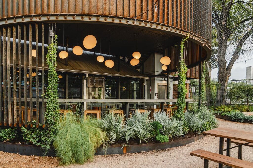 Cosmic Saltillo’s thoughtfully designed outdoor seating offers a garden-like retreat in East Austin. (Photo by Jane Yun)