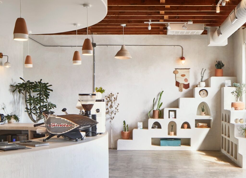 Plants and design-forward interiors define the atmosphere at Palomino East. (Photo courtesy of Palomino).