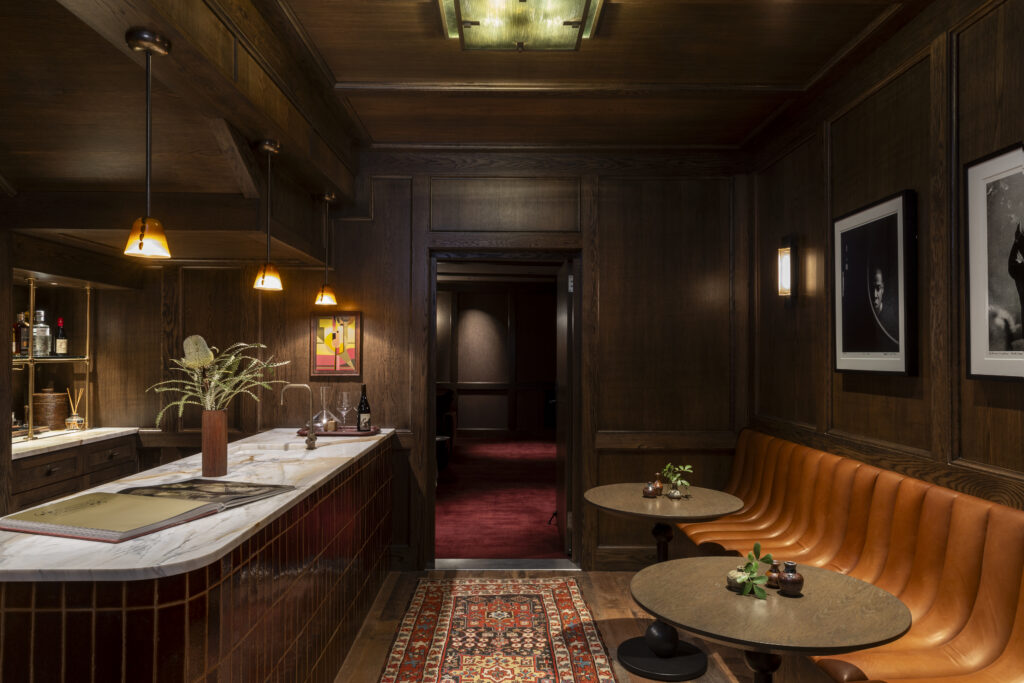 A former hall and closet were transformed into a speakeasy-style bar