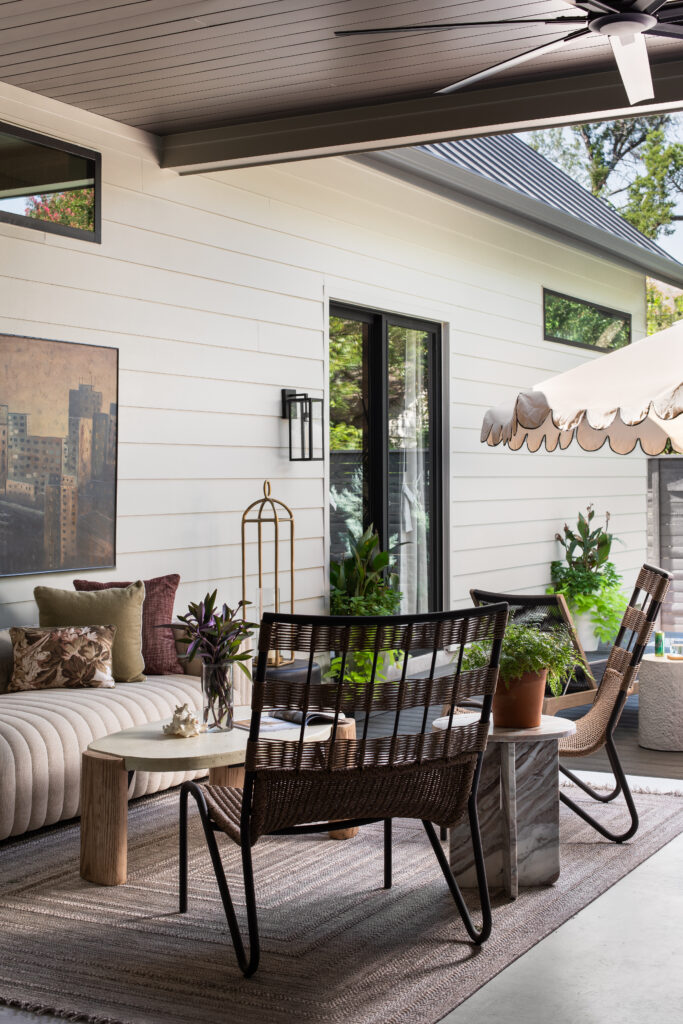 The backyard of the Bamford Drive home extends the living space outdoors with thoughtfully integrated landscaping, furnishings and gathering areas.