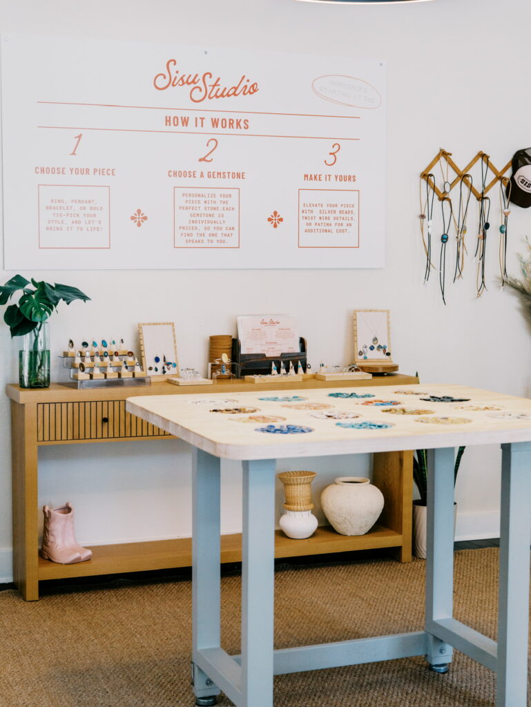 Participants choose gemstones before creating custom sterling silver jewelry during a Sisu Studio workshop. Classes can accommodate groups of up to 10 people.