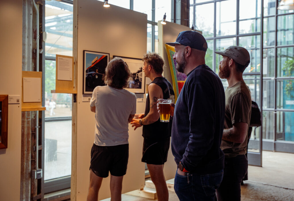Guests viewing the auto-focused art gallery curated by Manual Focus