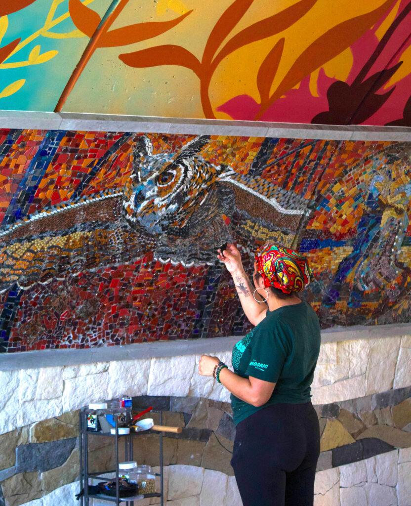 Vibrant tile scenes transform the once-empty underpass into a celebration of Austin culture. (Photo by Analise Pickerrell)