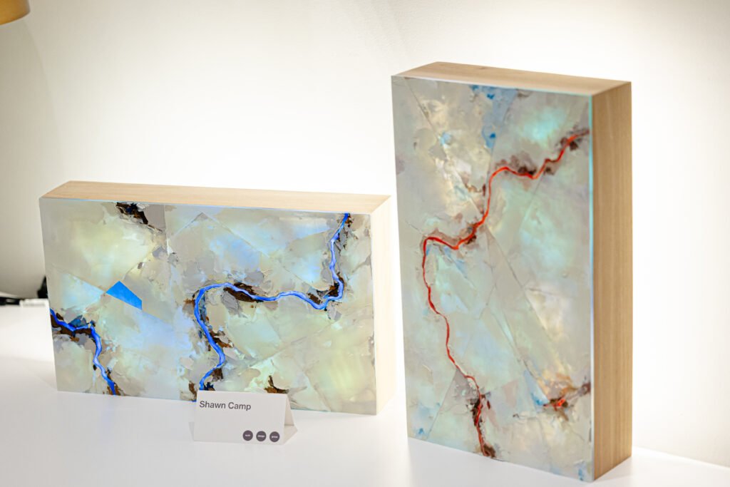Artwork by Shawn Camp is displayed during Britt Design Group’s annual “Evening of Art” exhibition in Austin.