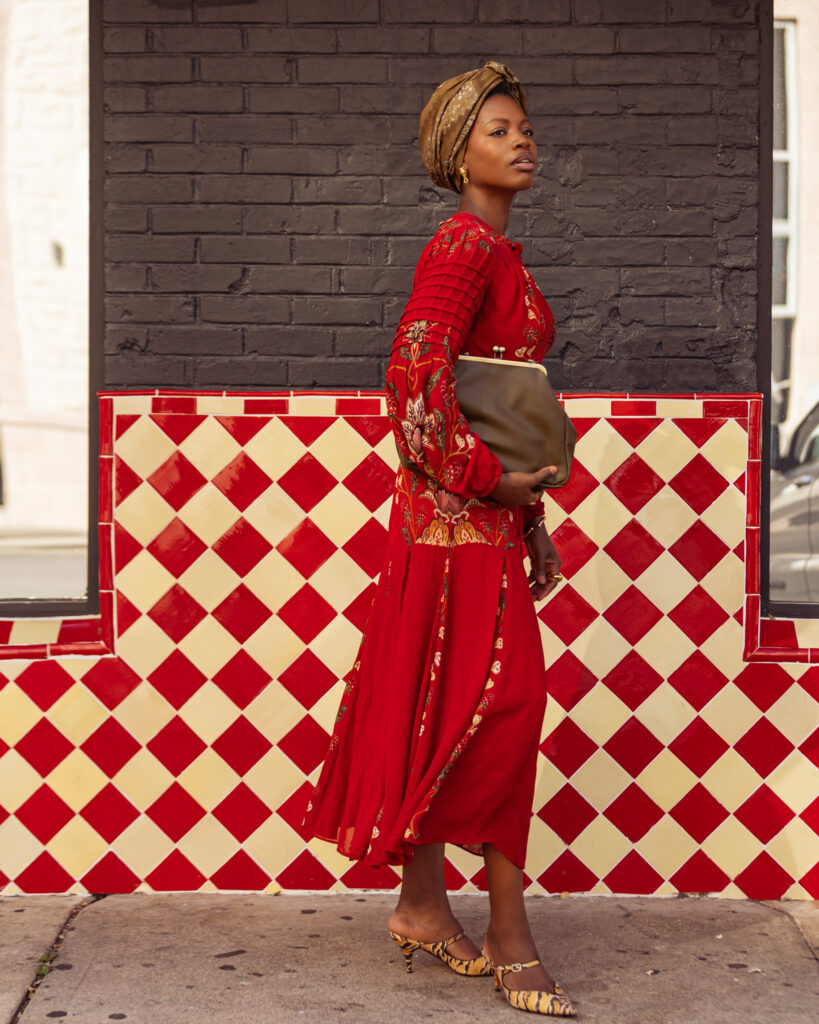 Paola Mathé, founder of Fanm Djanm, wears one of the brand’s signature headwraps.
