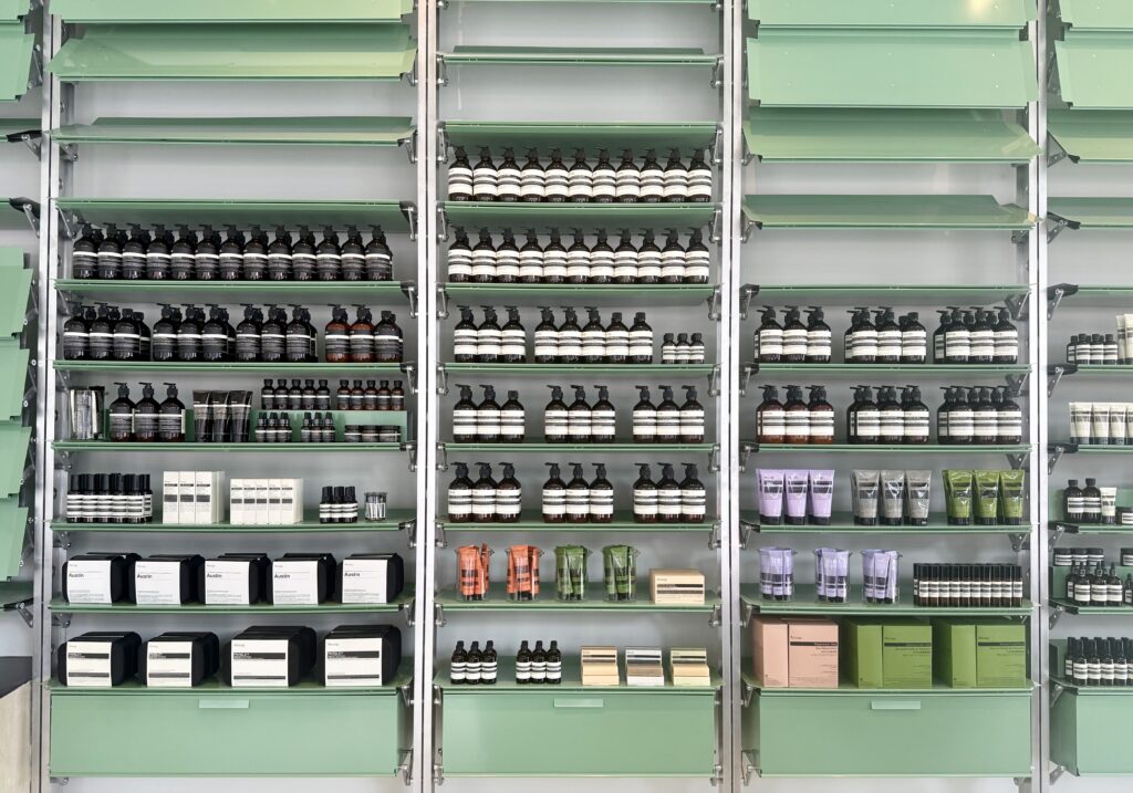 Shelving with Aesop skincare products in new Austin store.