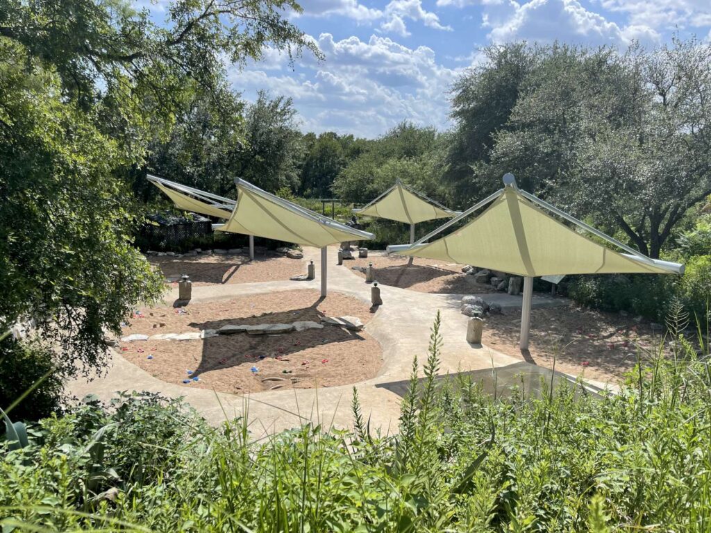 Visitors can dig for replica fossils at the Dino Pit at the Austin Nature & Science Center.