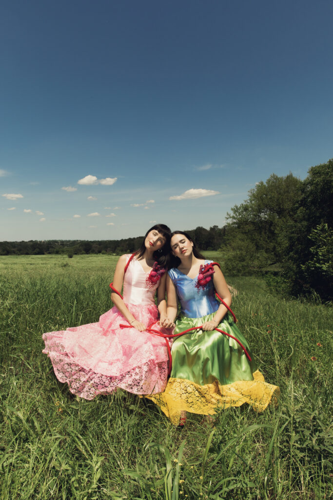 Elena Cásares and Isa Goren wearing Frida Kahlo-inspired fashion pieces designed by Morgan McGaughey and Millie Partin. (Photo by Kaity Cox)