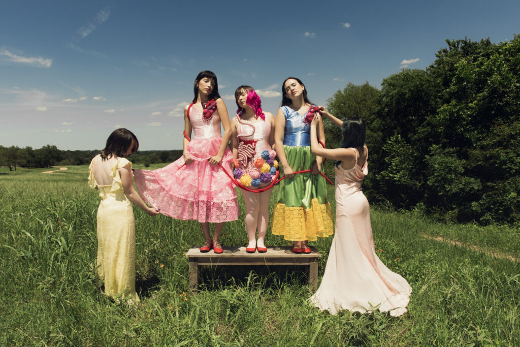 Student designers Morgan McGaughey and Millie Partin showcase their Frida Kahlo-inspired fashion collection, which won McCallum Fine Arts Academy’s student-run fashion show.