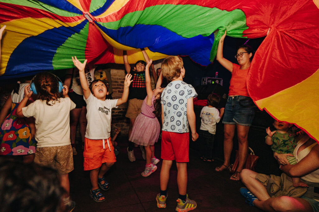 The Rock and Roll Playhouse performs during Hot Summer Nights in Austin’s Red River Cultural District.