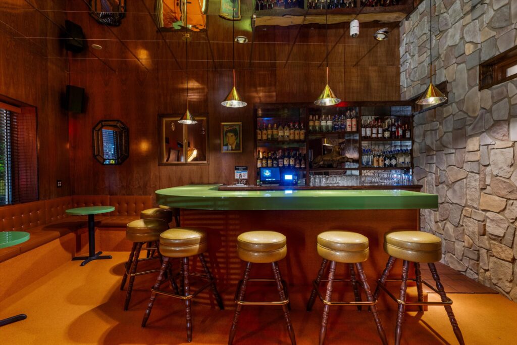 Guests can kick back in retro diner-style seating while enjoying drinks and bites. (Photo courtesy of The Flower Shop)