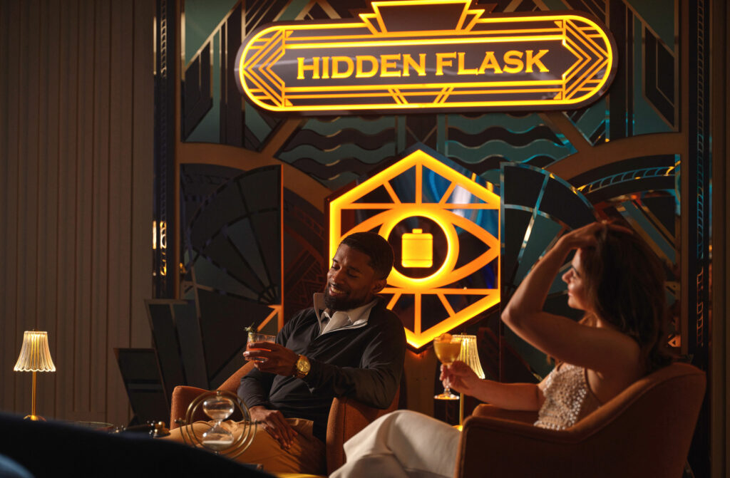 Couple enjoying cocktails in a speakeasy at Four Seasons Austin