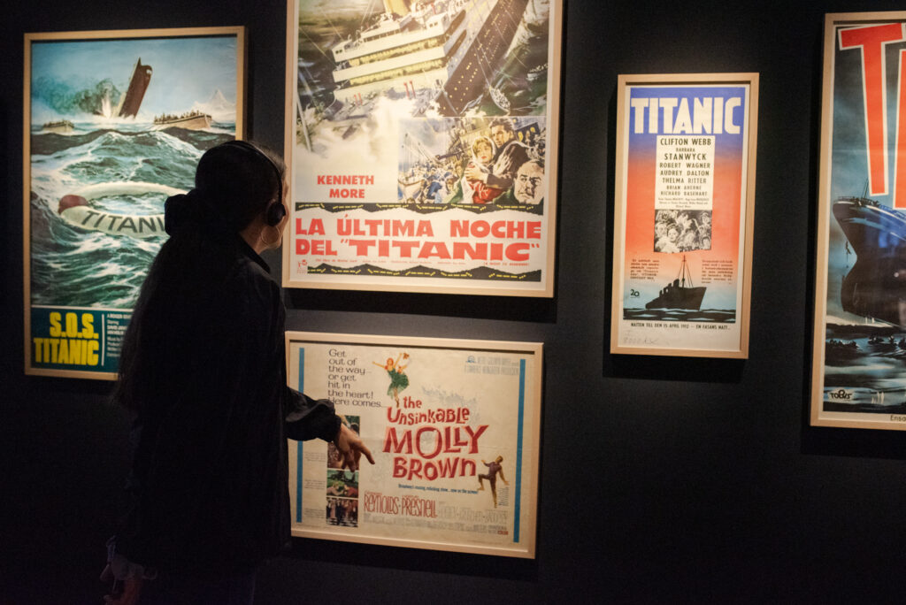 Movie posters inside the exhibit show how Hollywood has reimagined the ship’s story across generations.