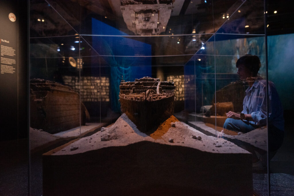 A model of the sunken Titanic shows the ship as it rests on the ocean floor more than a century after its 1912 sinking.