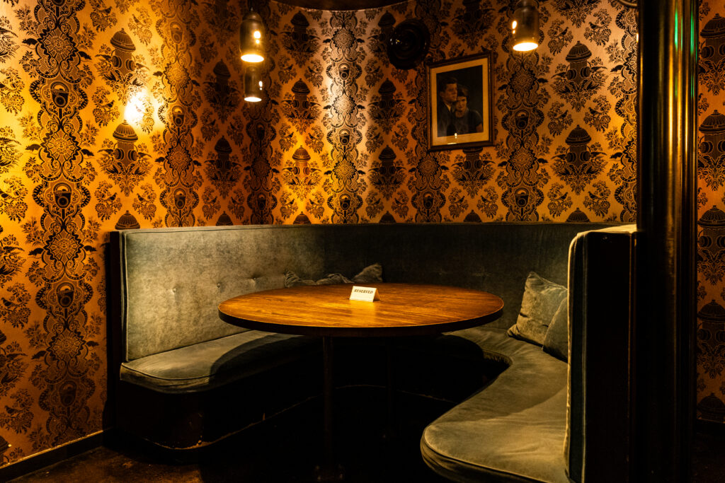 The interior of Small Victory, an intimate cocktail bar in downtown Austin.