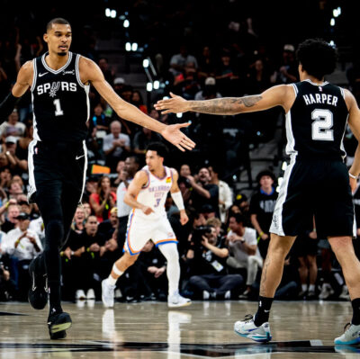San Antonio Spurs forward Victor Wembanyama high fives San Antonio Spurs guard Dylan Harper during the first quarter of six of the western conference finals game against the Oklahoma City Thunder at the Frost Bank Center in San Antonio, Texas Thursday, May 28, 2026. (Photo by Reginald Thomas II/San Antonio Spurs)