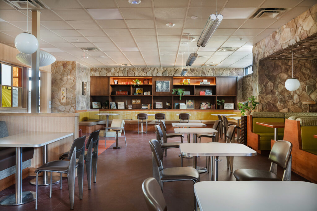 The interior of A Little Shady in Kyle blends original Shady Grove furnishings with 1970s-inspired details by designer Kim Lewis.