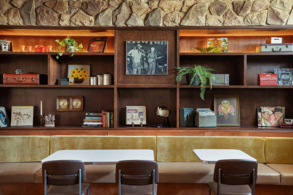 Original Shady Grove photos and memorabilia line the walls at A Little Shady in Kyle