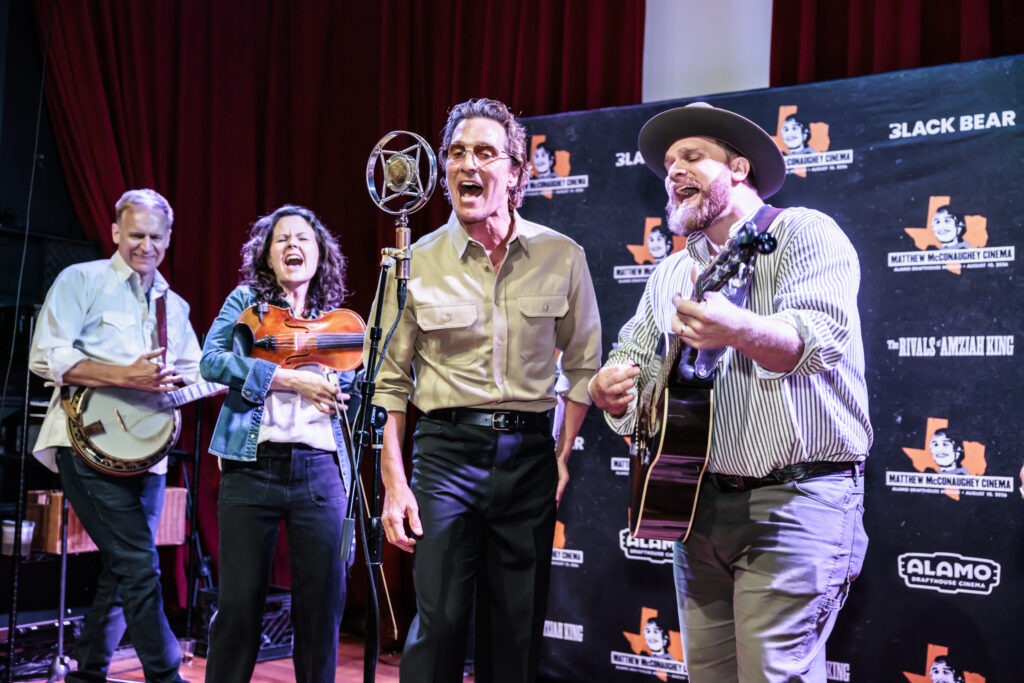 Matthew McConaughey performs with The Last Bison during the afterparty at Alamo Drafthouse Mueller.