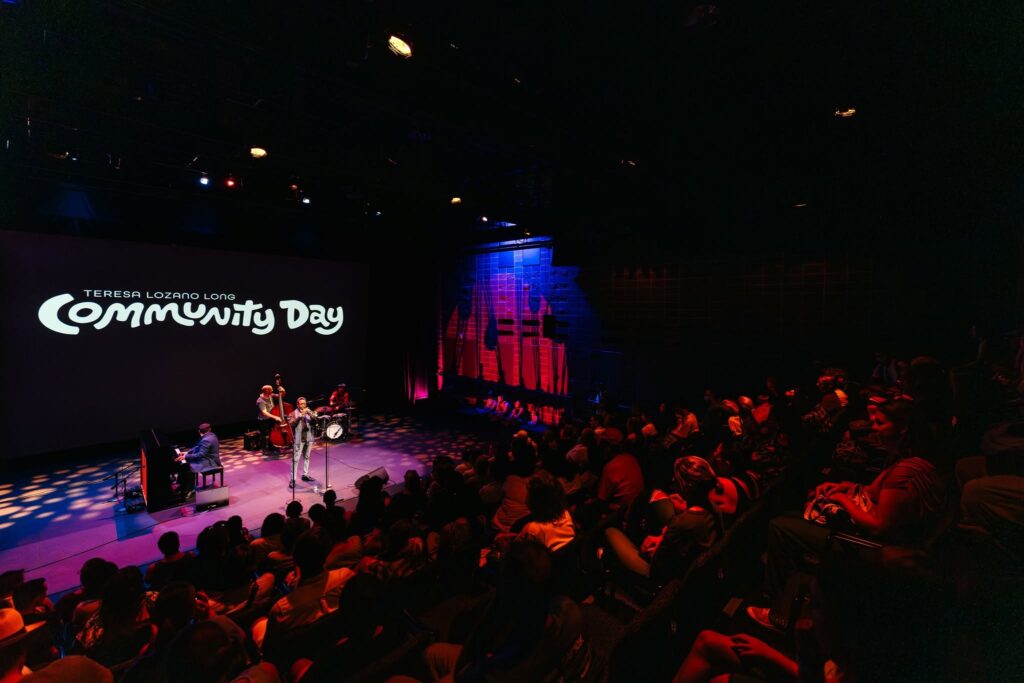 musical performance on stage at the Long Center during their annual Community Day