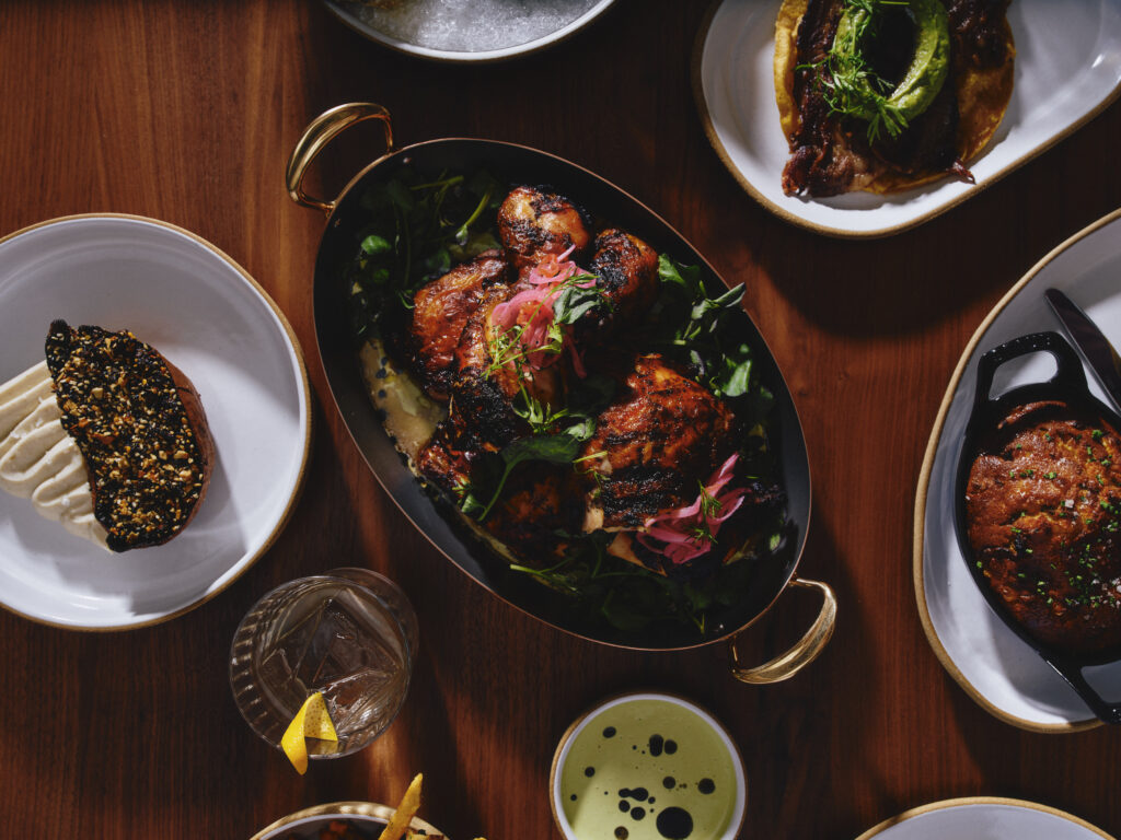 a table of mexican dishes at 1 Hotel Austin's restaurant, Alteño.