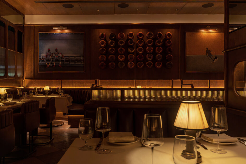 A commissioned work by artist Tyrrell Winston anchors the dining room at Austin Sports Club. (Photo by Scene Select)