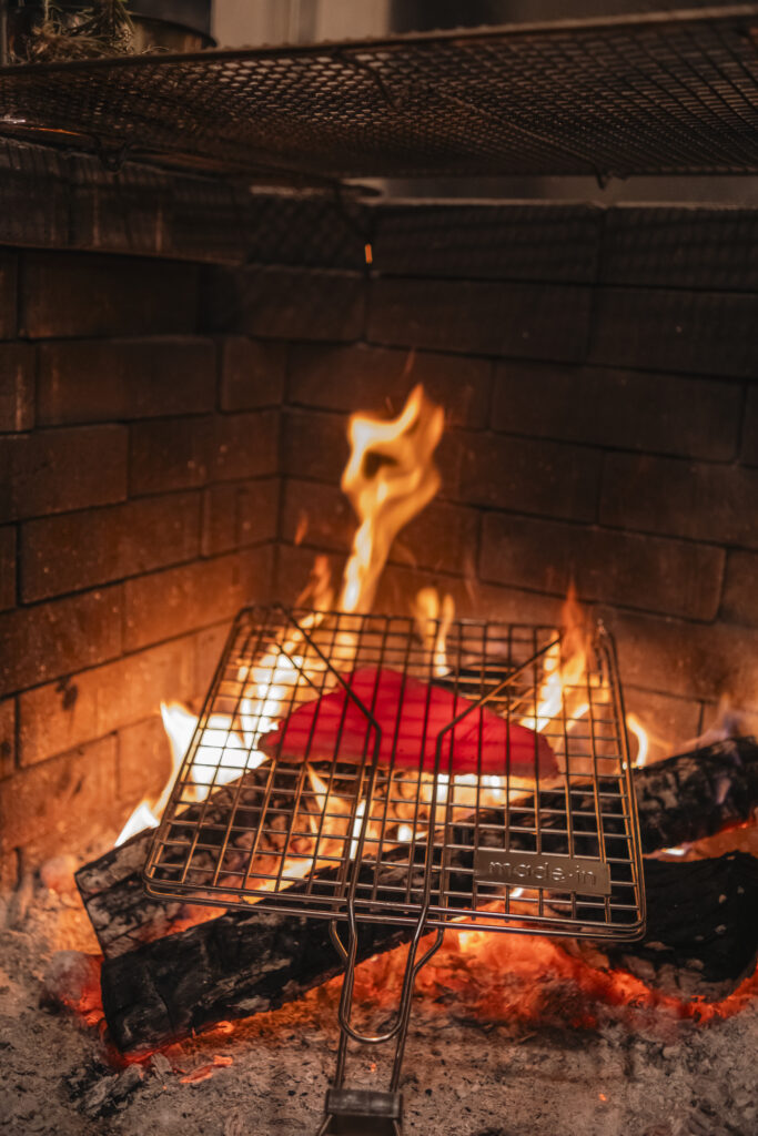 A live-fire hearth anchors the kitchen at Big Slick