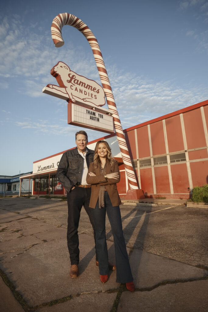 Craig Cavileer and Kayla Wilkie-Kinne, co-founders of Delightful Development Co., stand outside the Lammes Candies store in Austin.