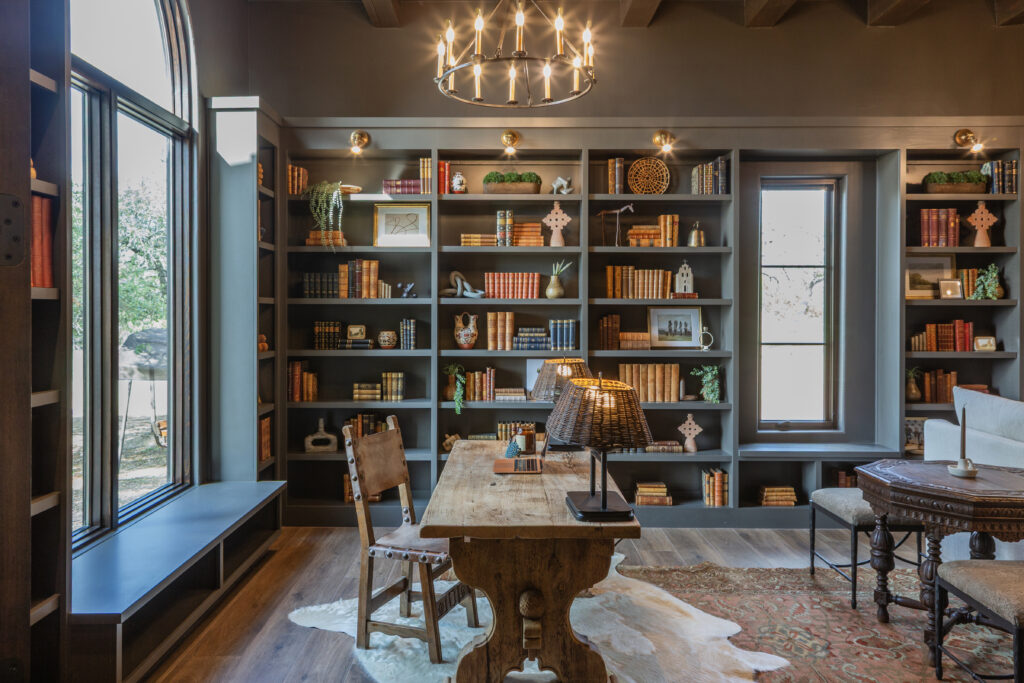 Built-in shelves filled with books and collected objects at Casa Zia. (Photo by Brittany Dawn Photography)