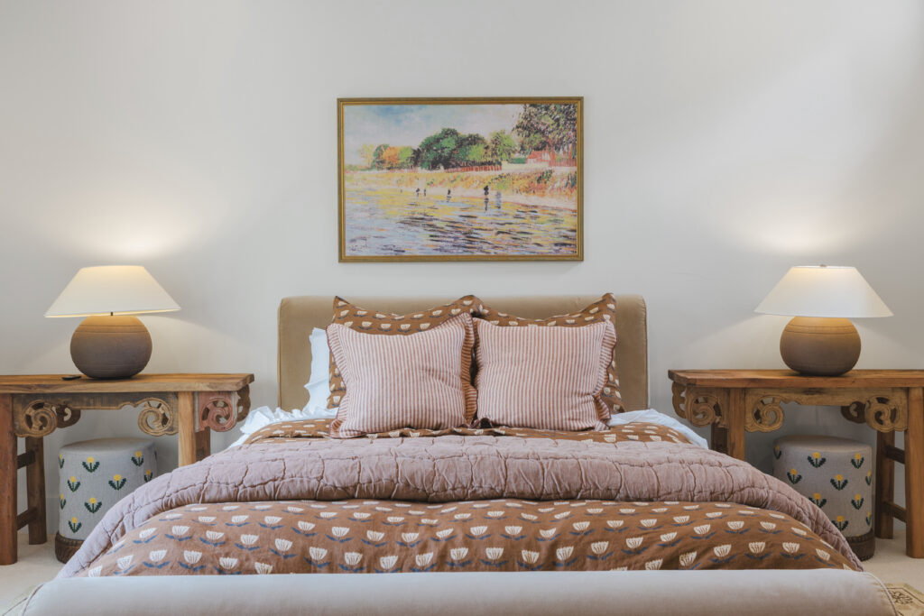 Designer Danyale Keim mixed vintage furnishings with custom details to give Casa Zia’s primary bedroom a lived-in feel. (Photo by Brittany Dawn Photography)