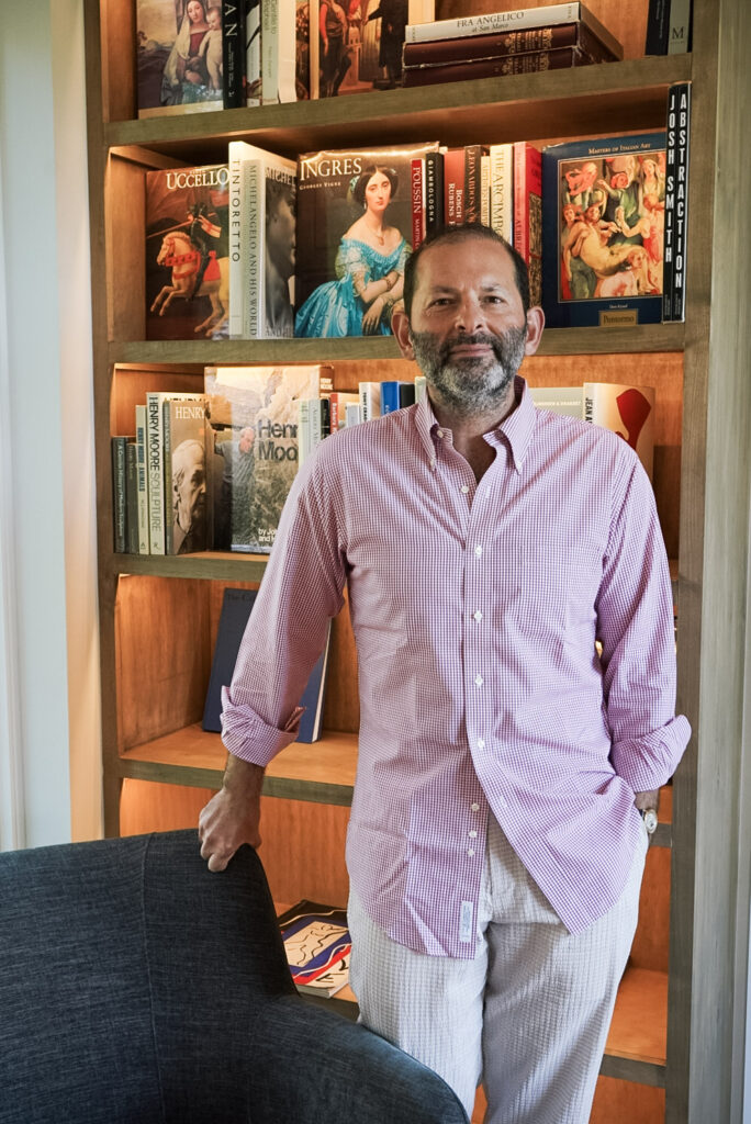Sacha Zerbib, Ostillo’s founding director and chief curator, stands in the foundation’s public art library.